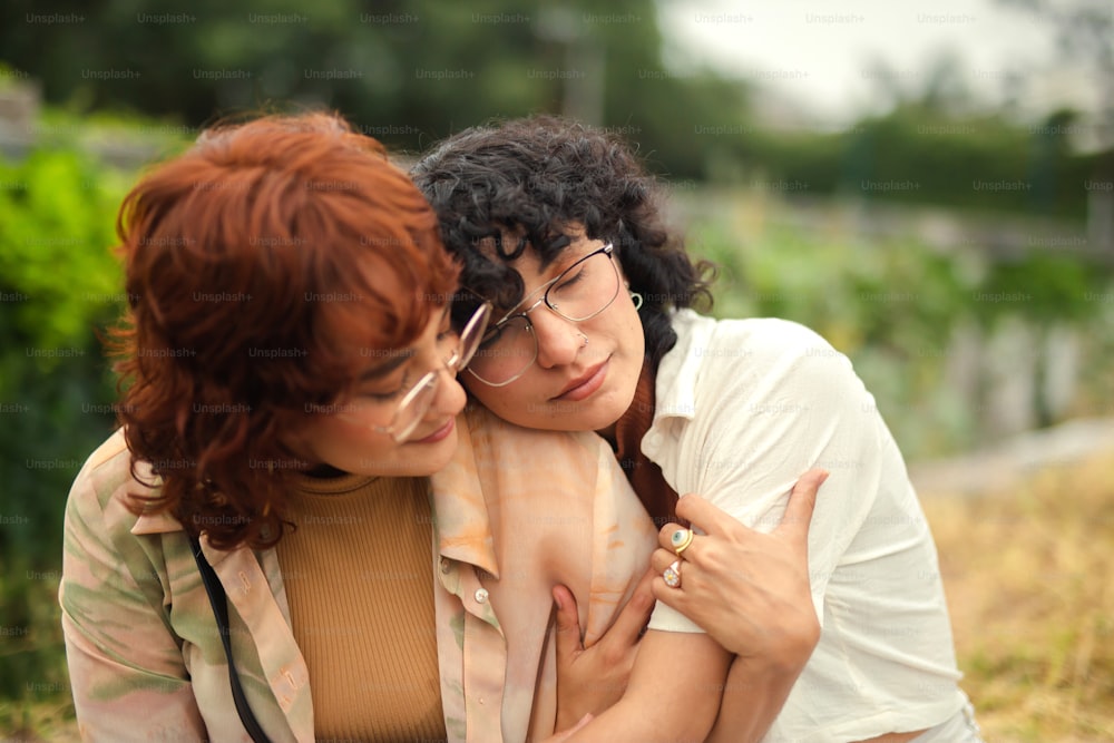 a couple of women that are hugging each other