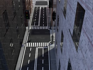 an aerial view of a city street with a traffic light