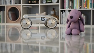 a purple teddy bear sitting in front of a toy car