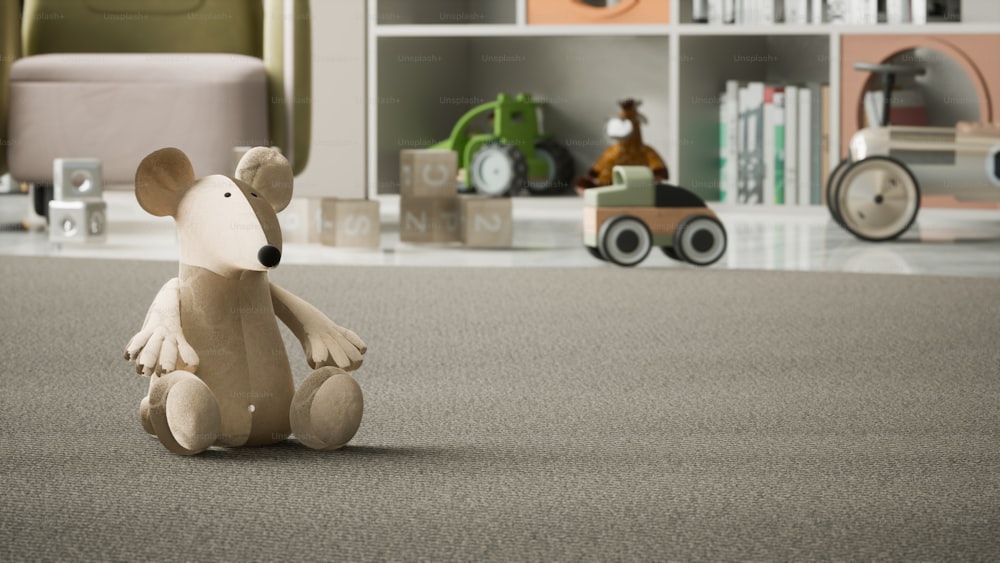 a stuffed mouse sitting on the floor in a room