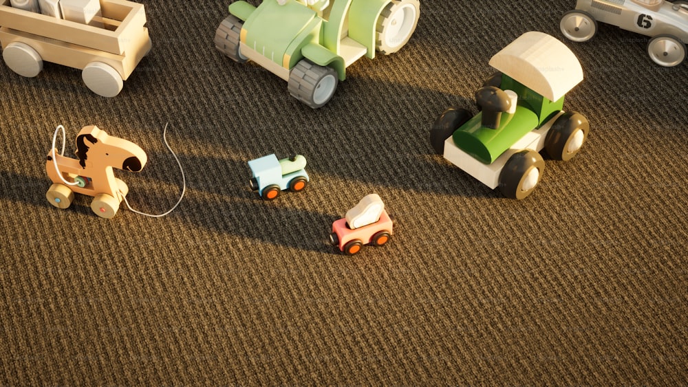 a group of toy cars sitting on top of a carpet