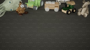 Un gruppo di giocattoli seduti sopra un tappeto