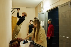 a group of people standing in a hallway