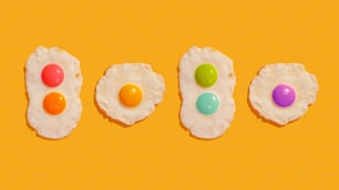 a group of three cookies with eggs on them