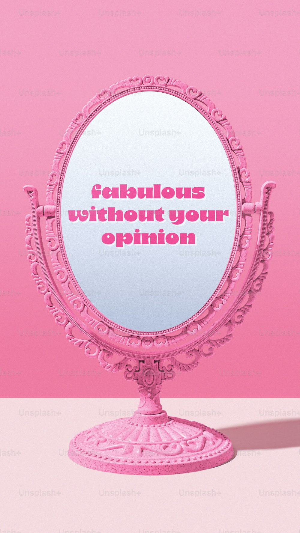 분홍색 배경의 분홍색 화장대 거울