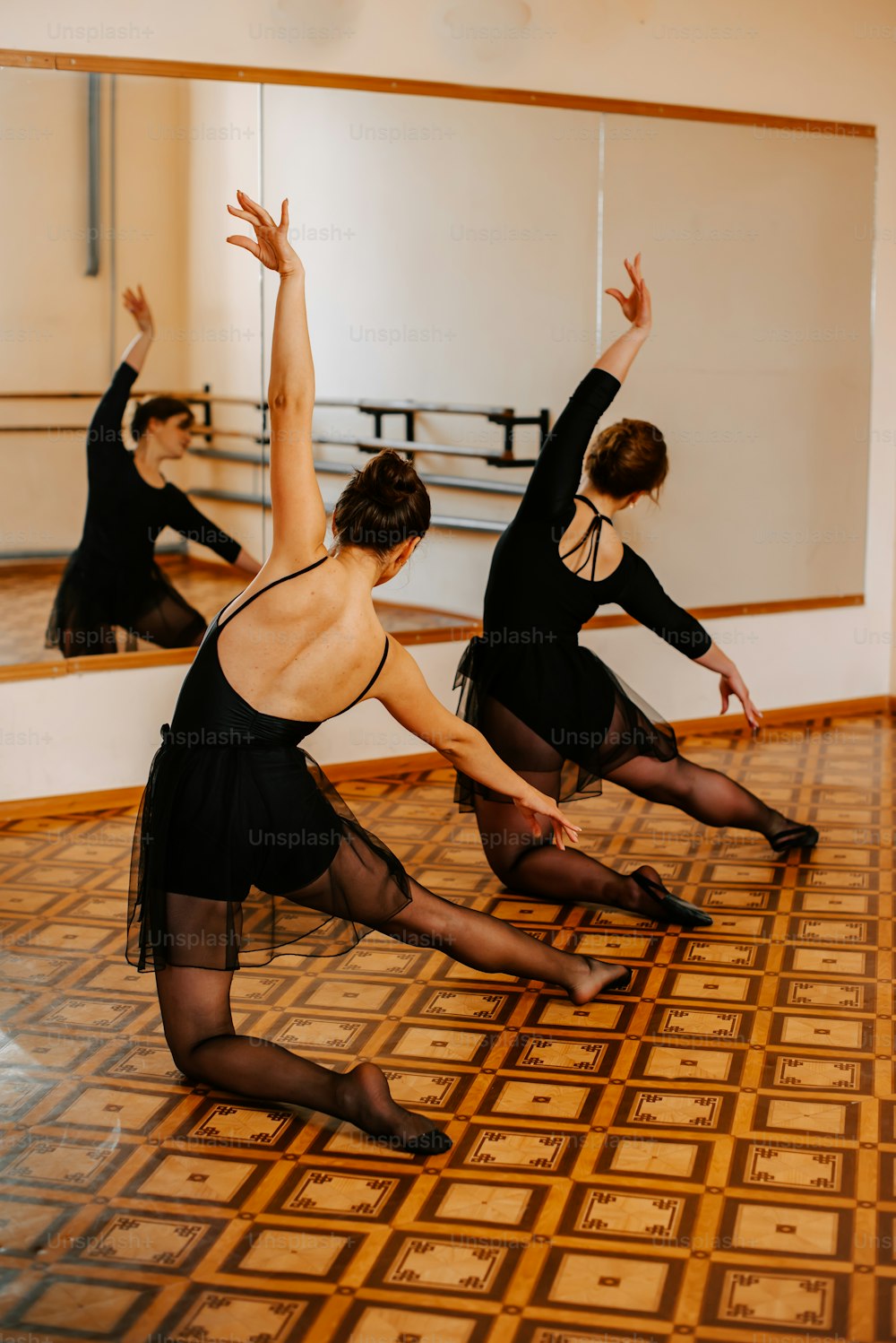 a group of dancers in a dance studio