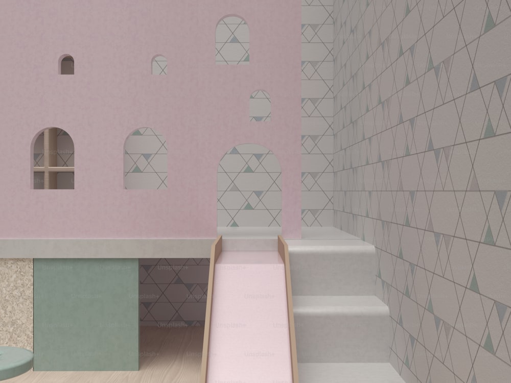 a room with a staircase and a pink wall