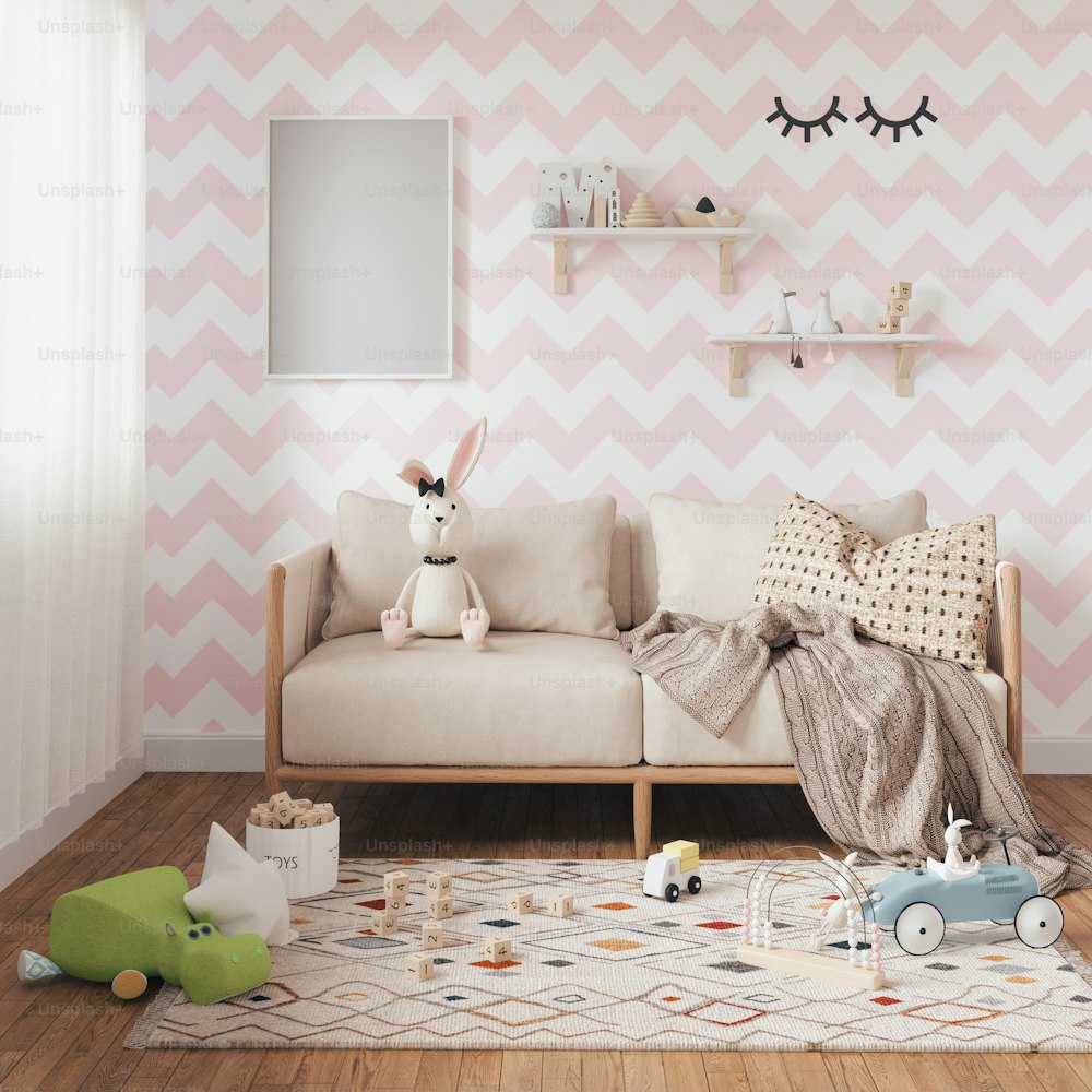 a living room with pink and white chevron wallpaper