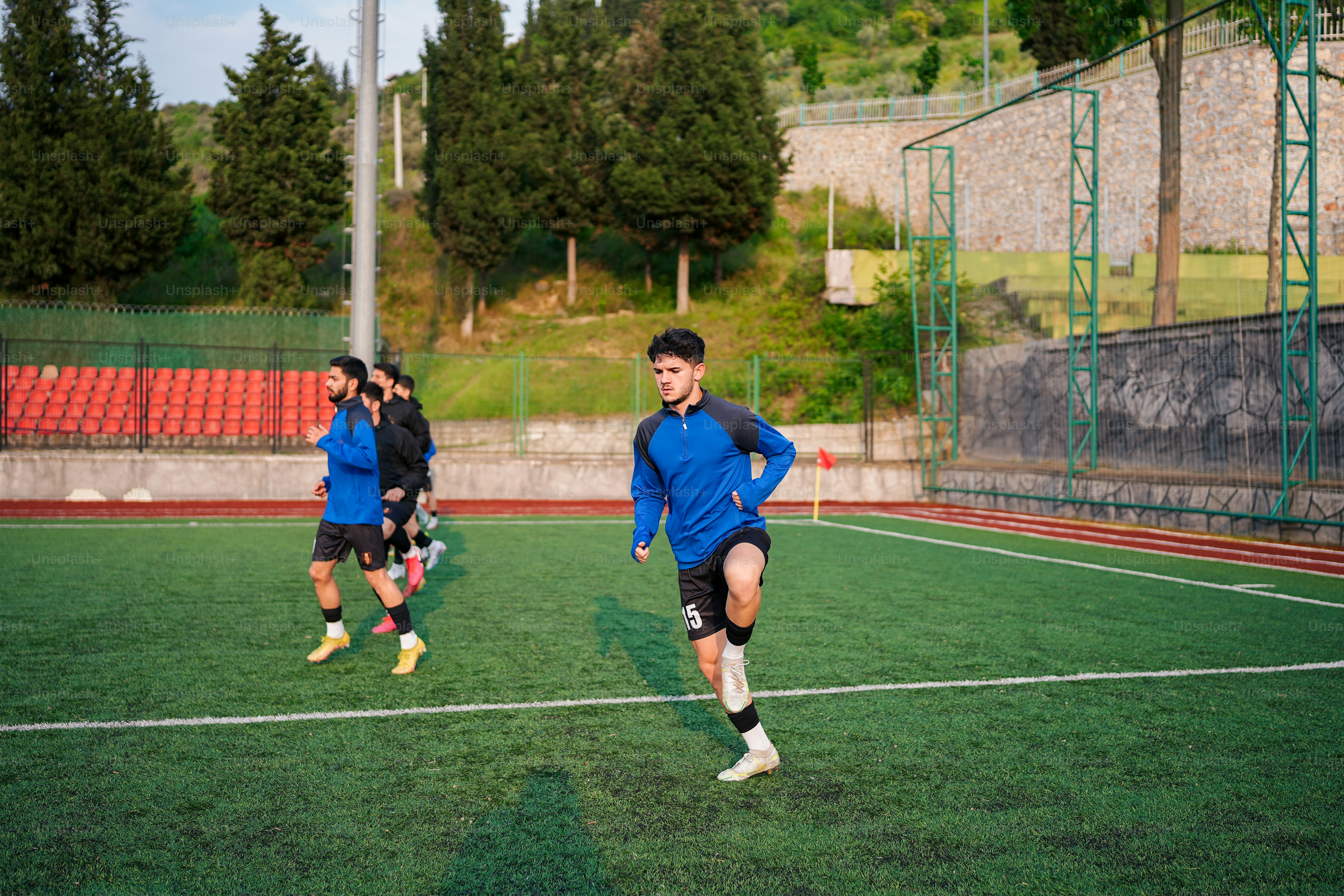 a group of young men playing a game of soccer