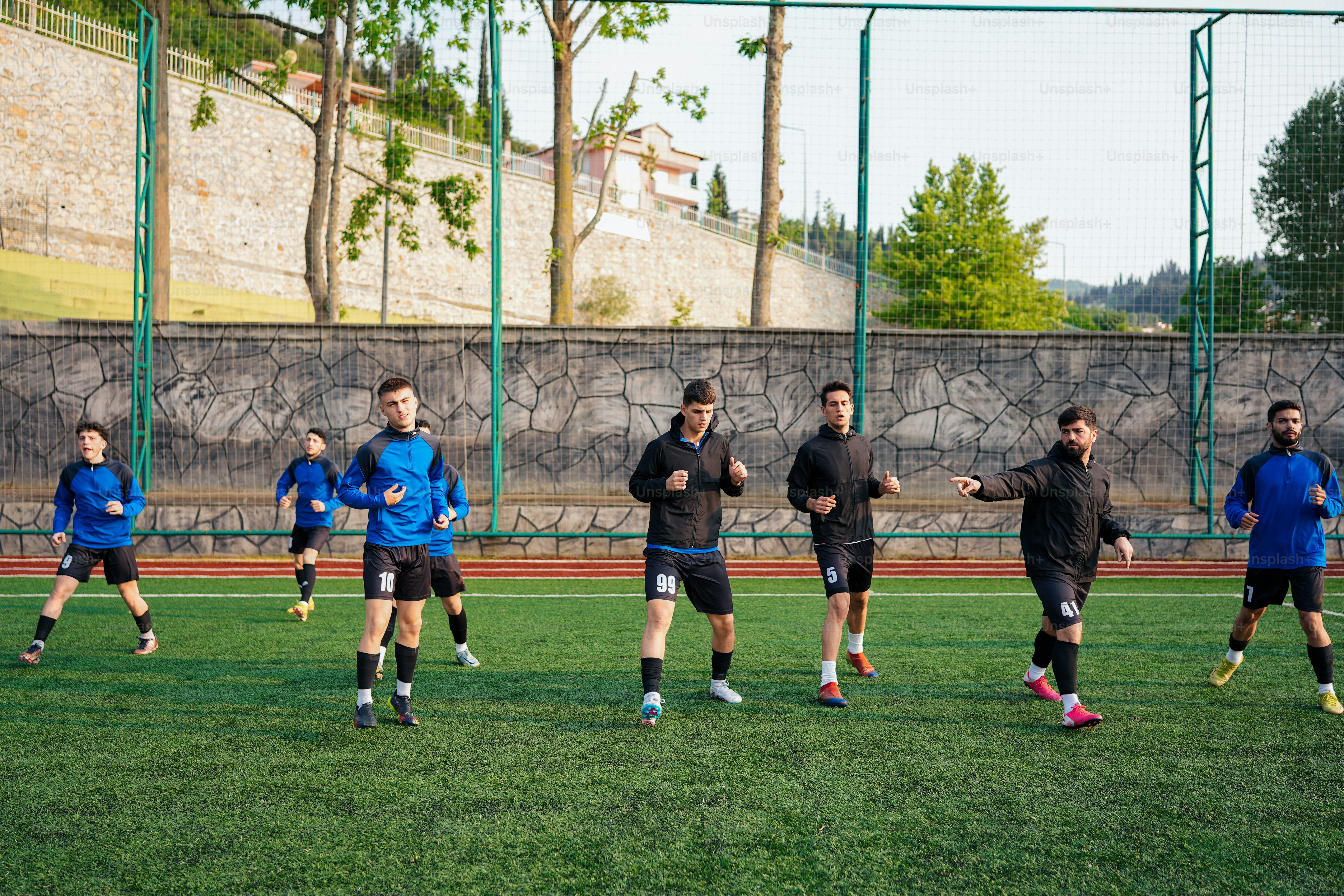 a group of young men playing a game of soccer