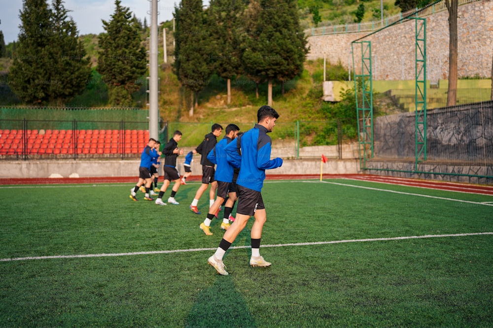 a group of young men playing a game of soccer
