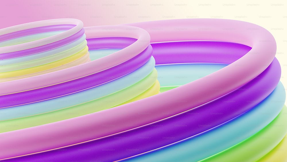 um monte de anéis de cores diferentes empilhados uns sobre os outros