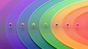 a bunch of different colored circles in a row