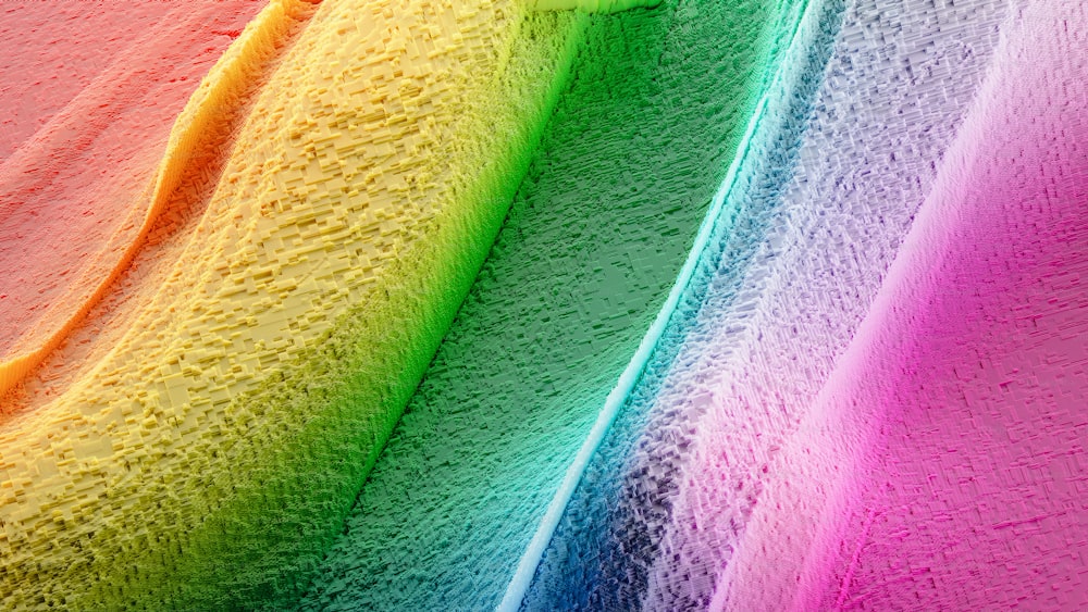 a close up of a rainbow colored towel