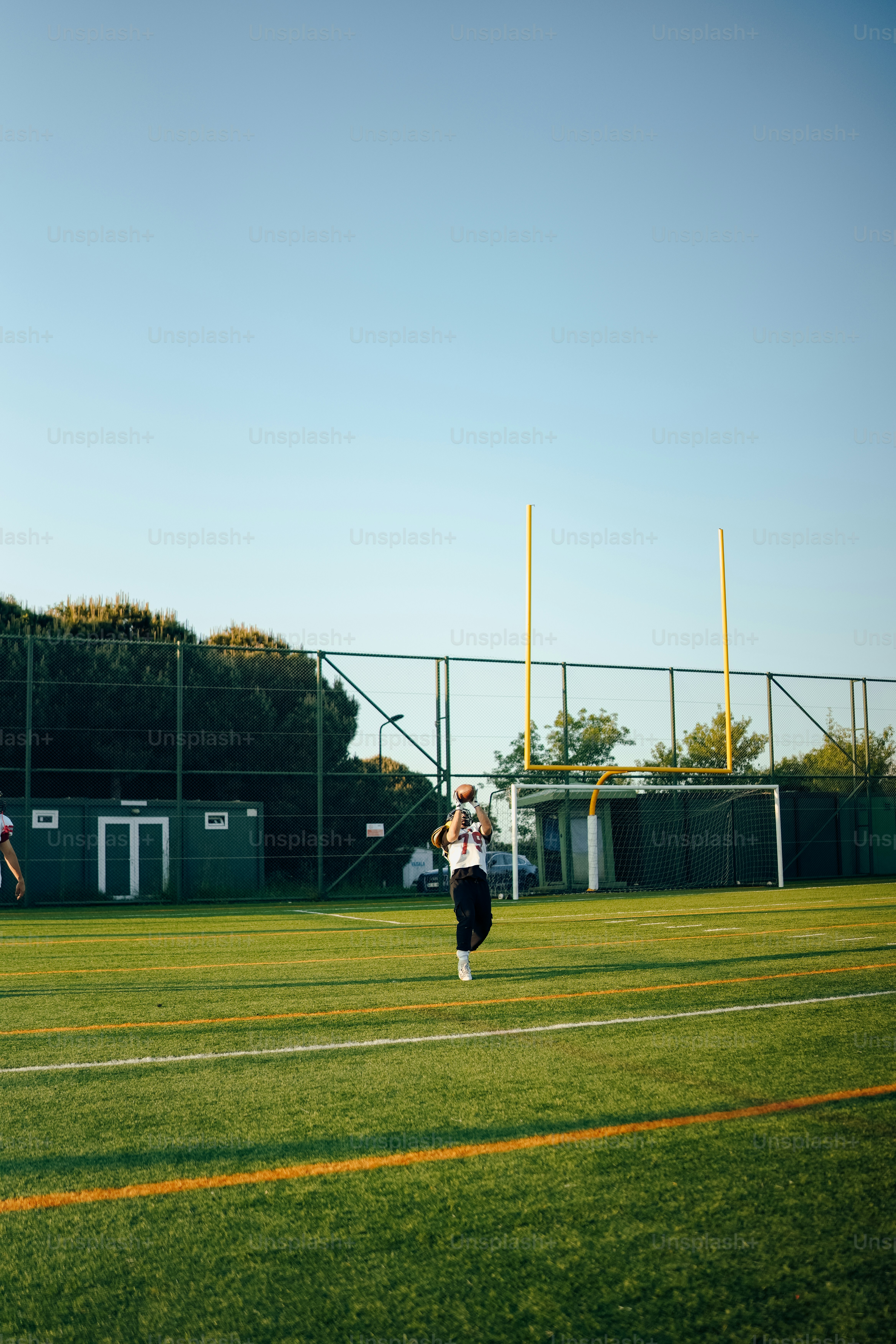 a person on a field with a frisbee