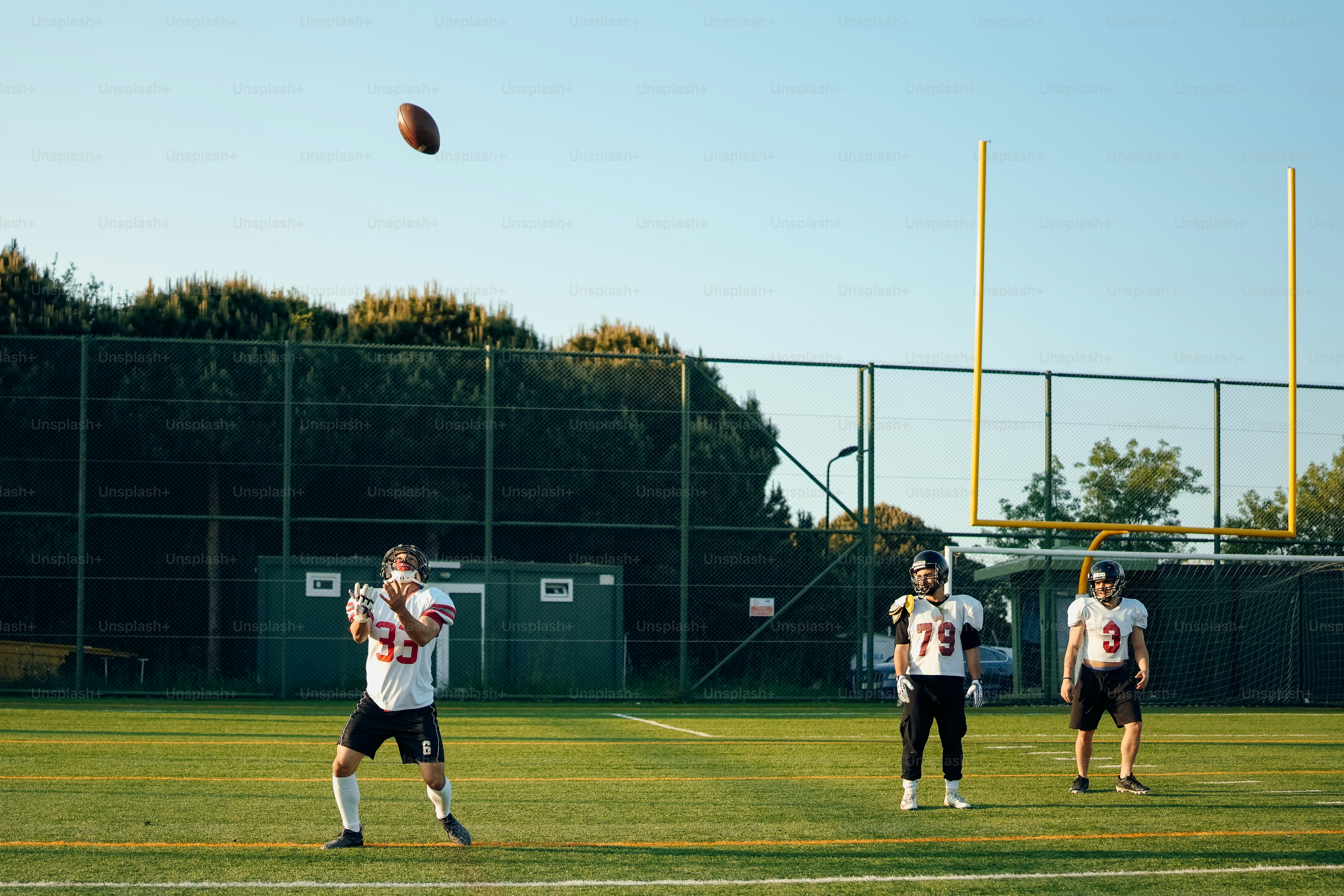 a group of young men playing a game of football