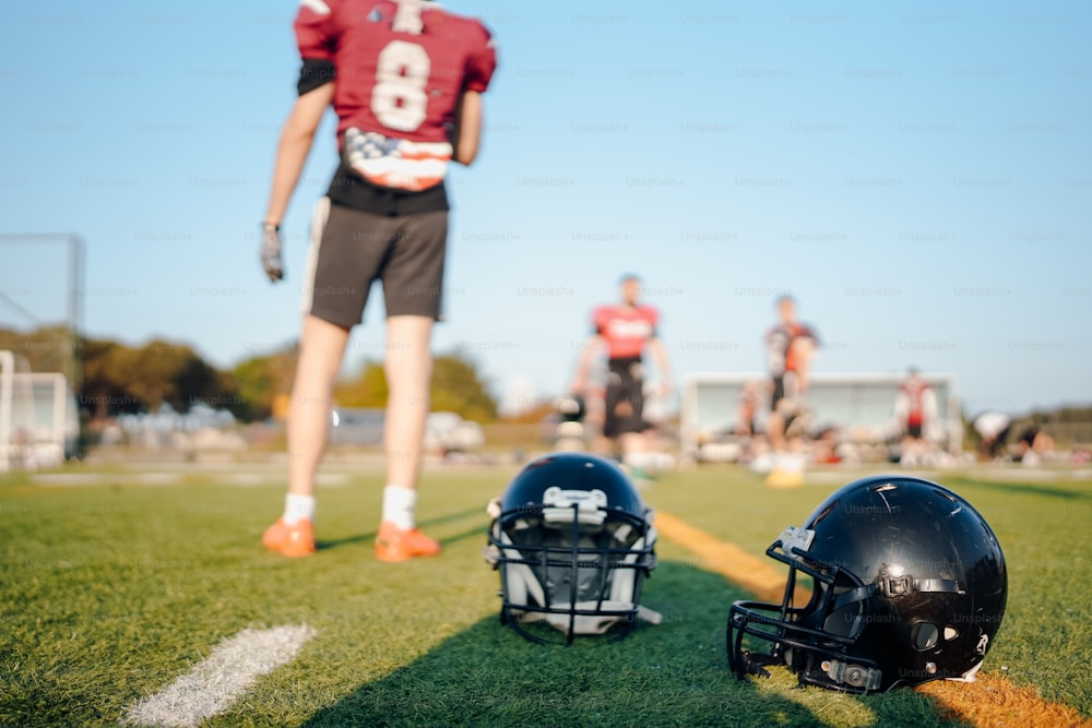 a football helmet and helmet on the field