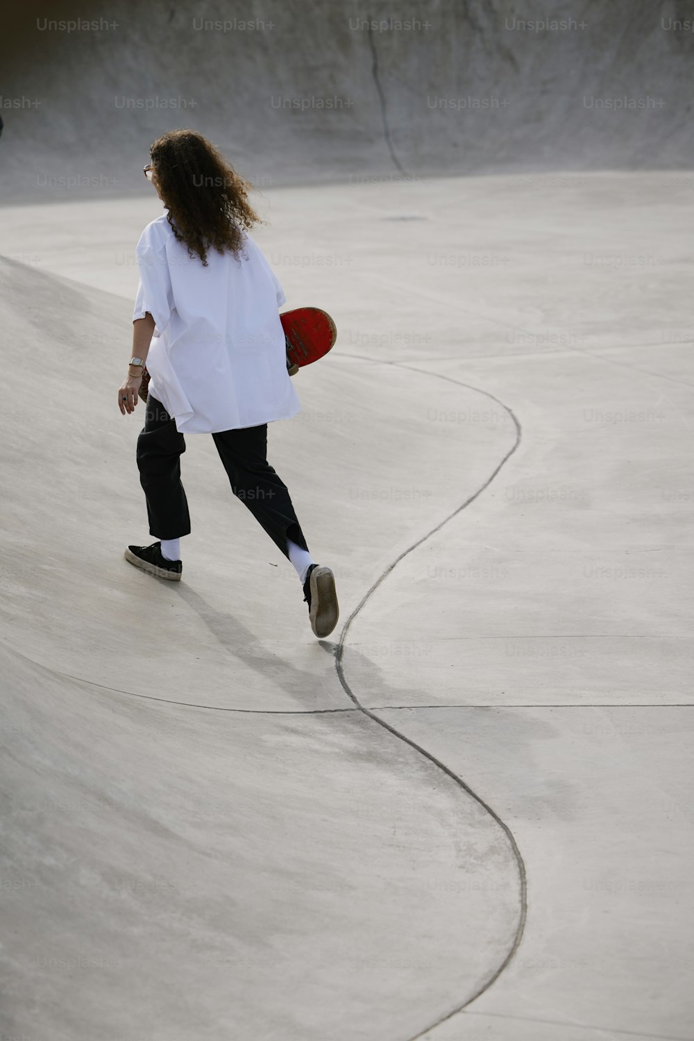 a person riding a skate board on a ramp