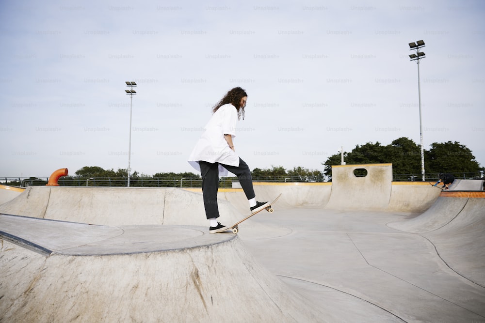a person riding a skate board at a skate park
