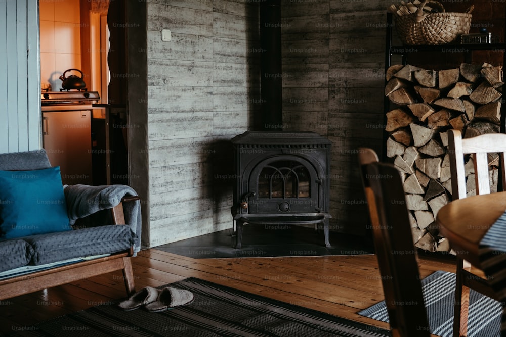 a living room with a chair and a fire place