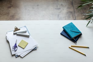 a white table topped with lots of different items