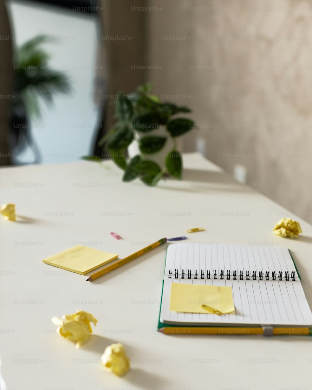 a notepad and a pen on a table