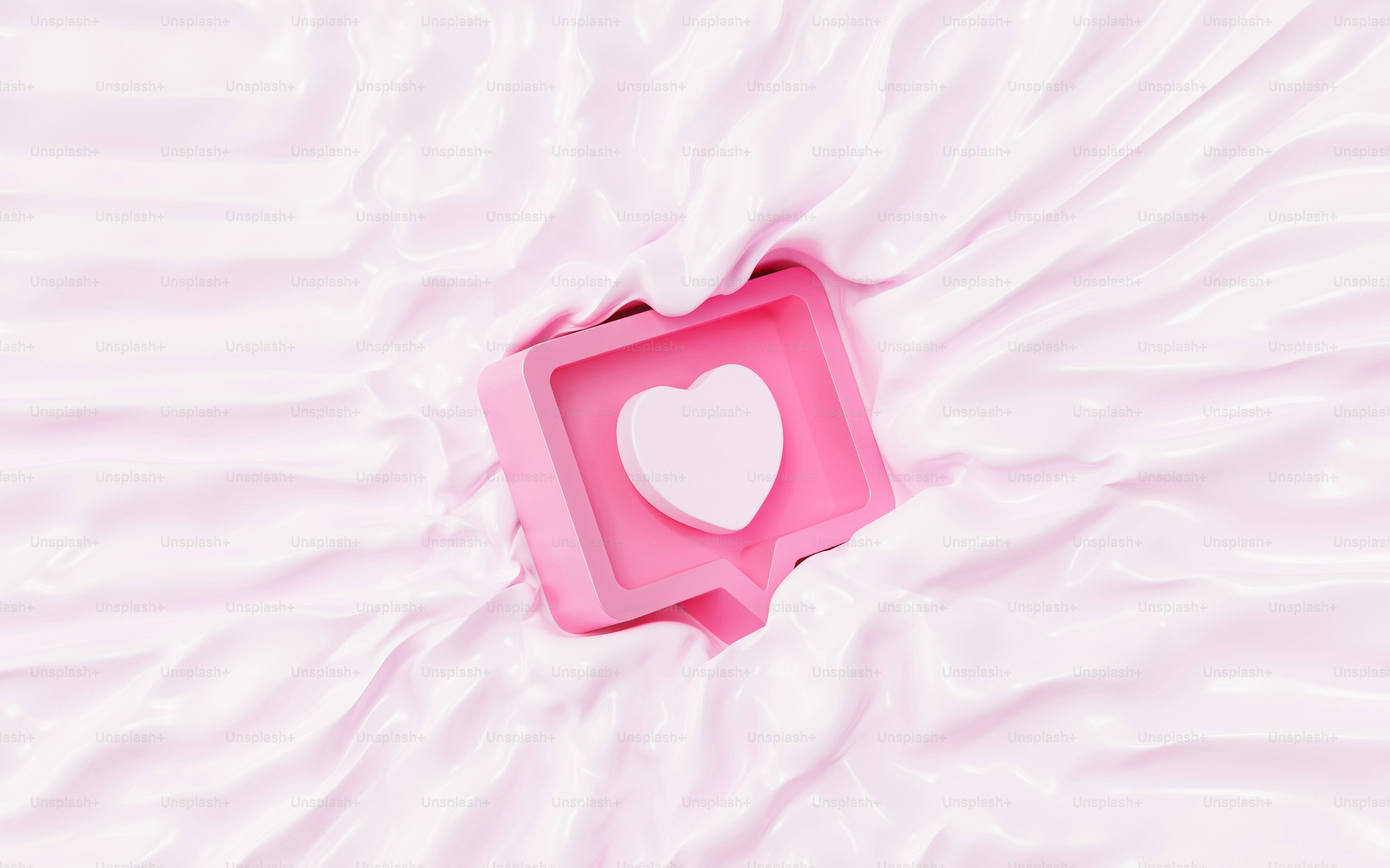 a pink box with a white heart in it