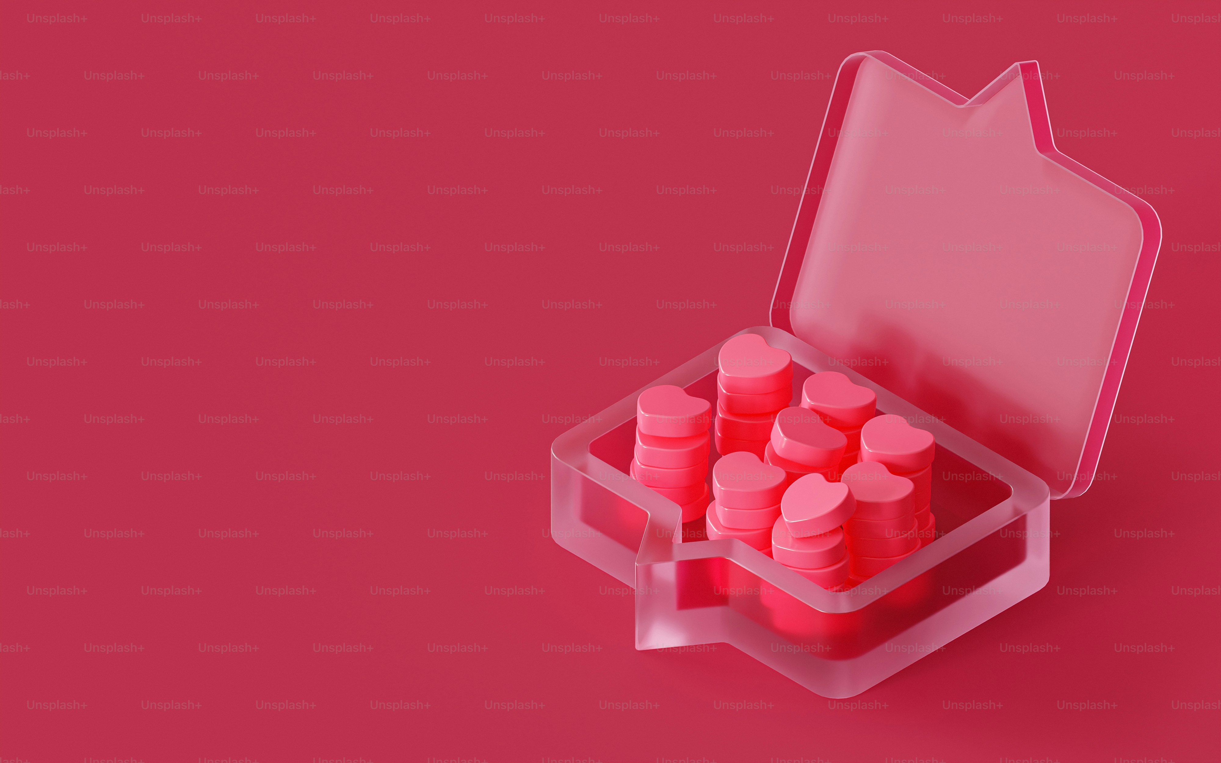 a pink case filled with pink pills on a pink background