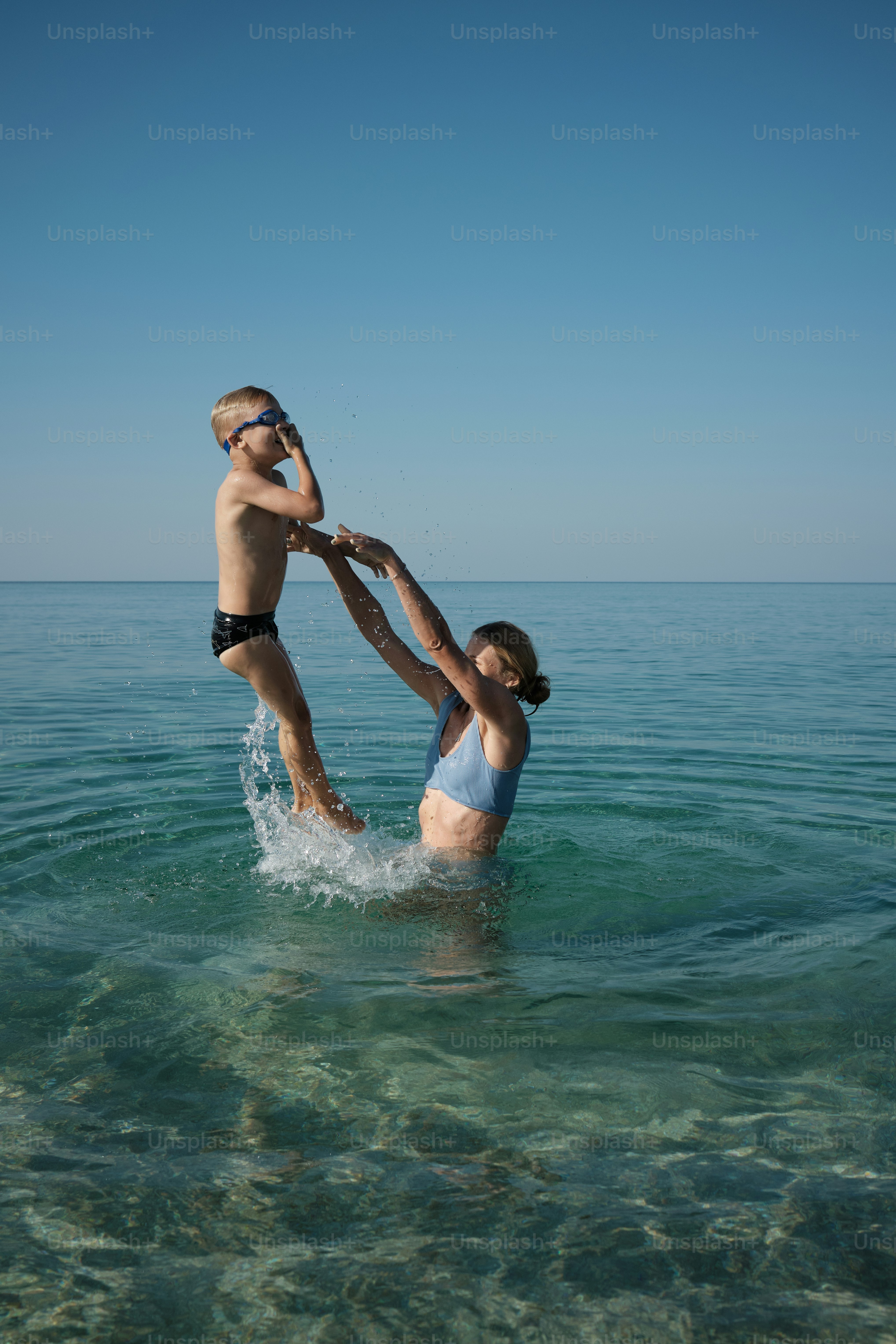 a couple of people that are in the water