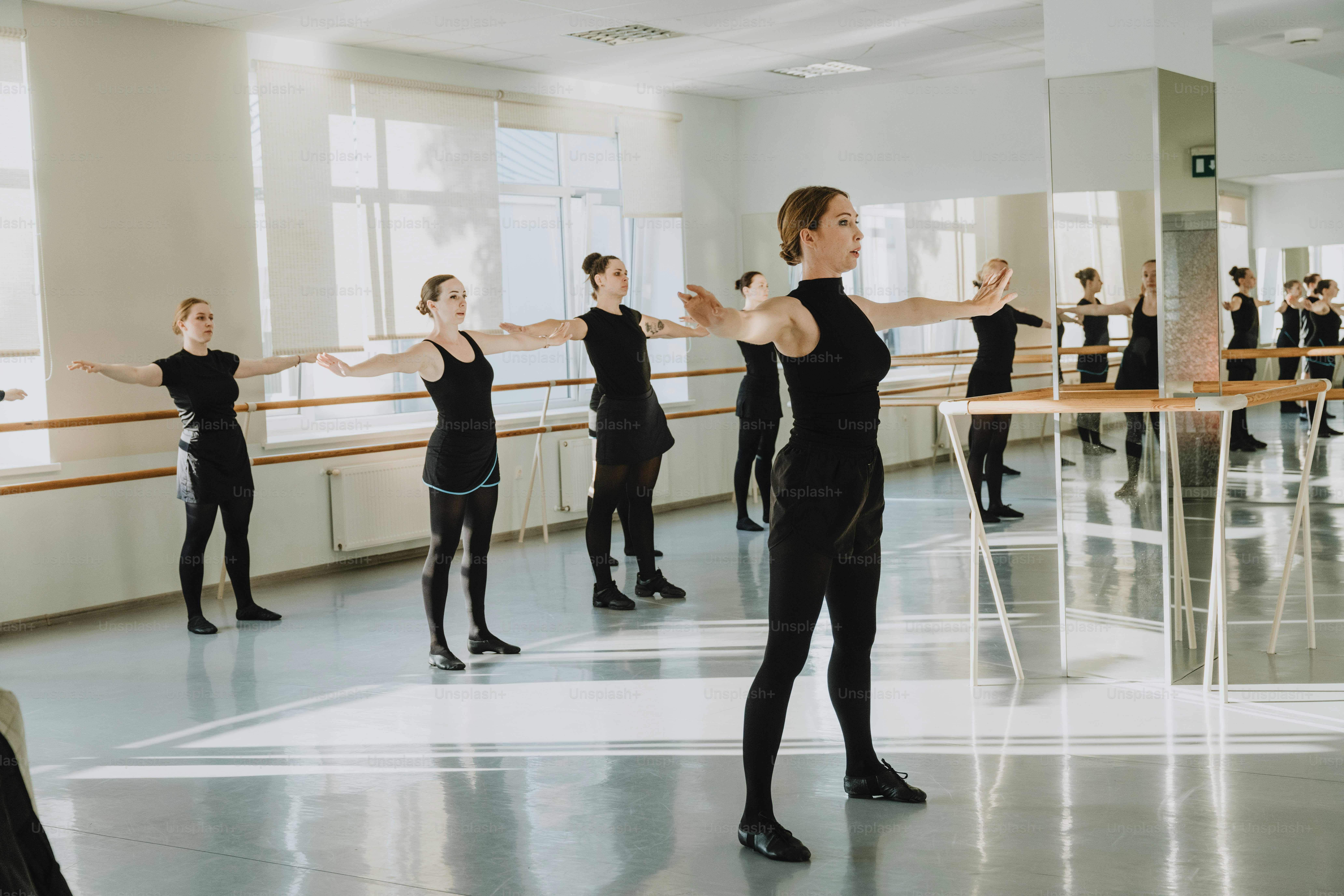 A group of people dancing in a dance studio photo – Dance Image on Unsplash