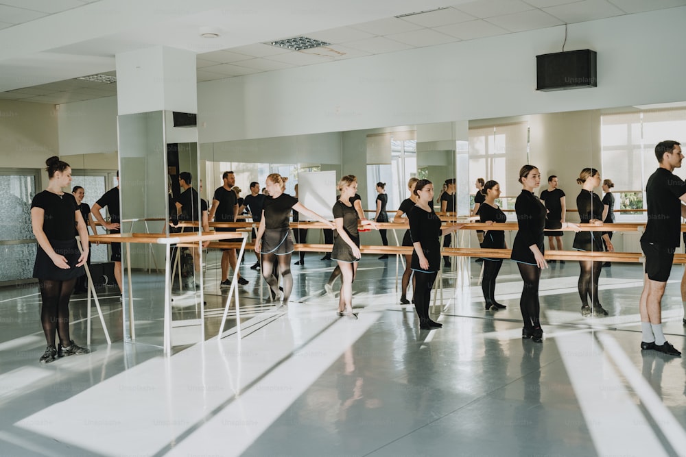 a group of people standing in a room