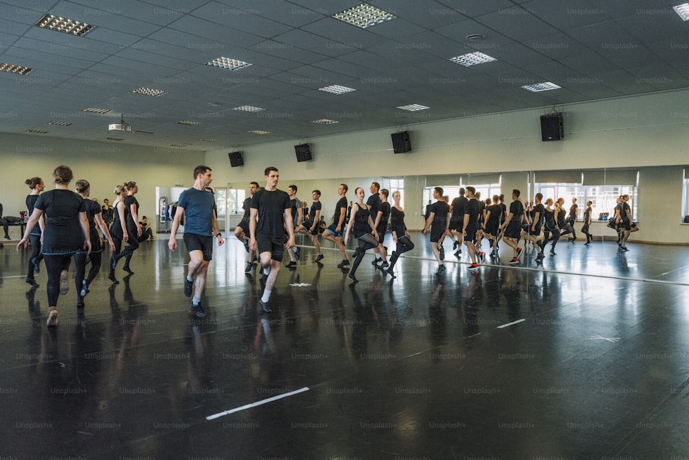 a large group of people in a gym