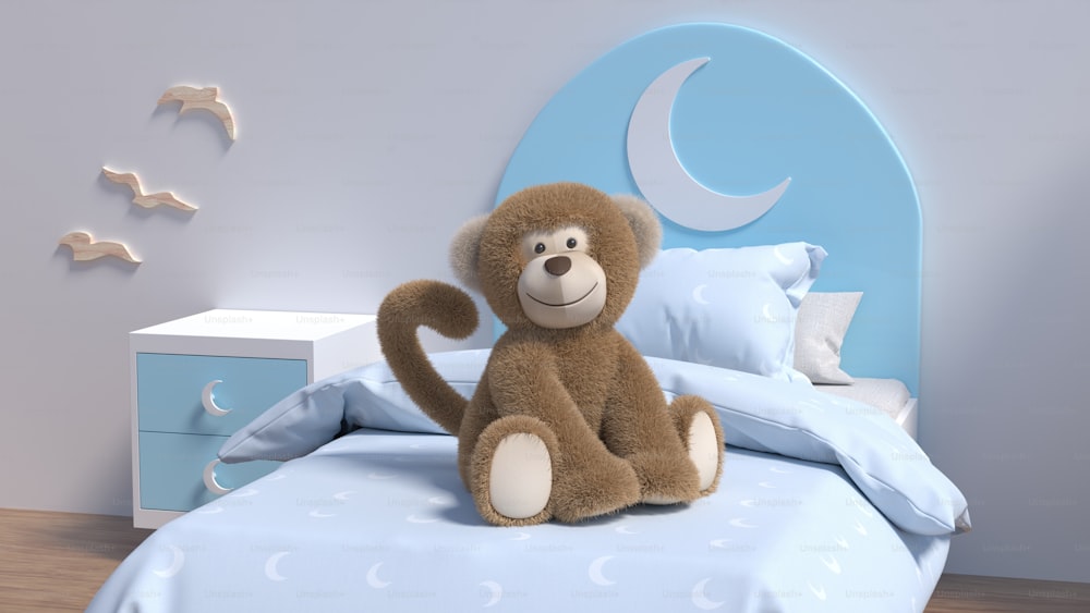 a brown teddy bear sitting on a bed