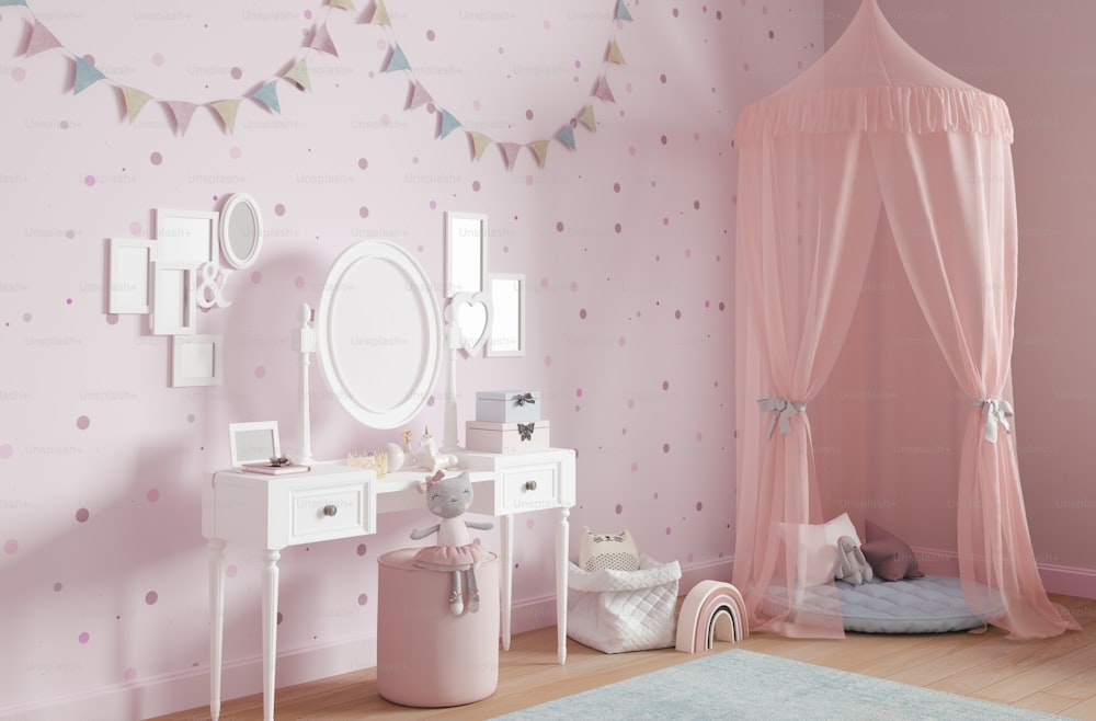 um quarto de criança com uma cama de dossel rosa
