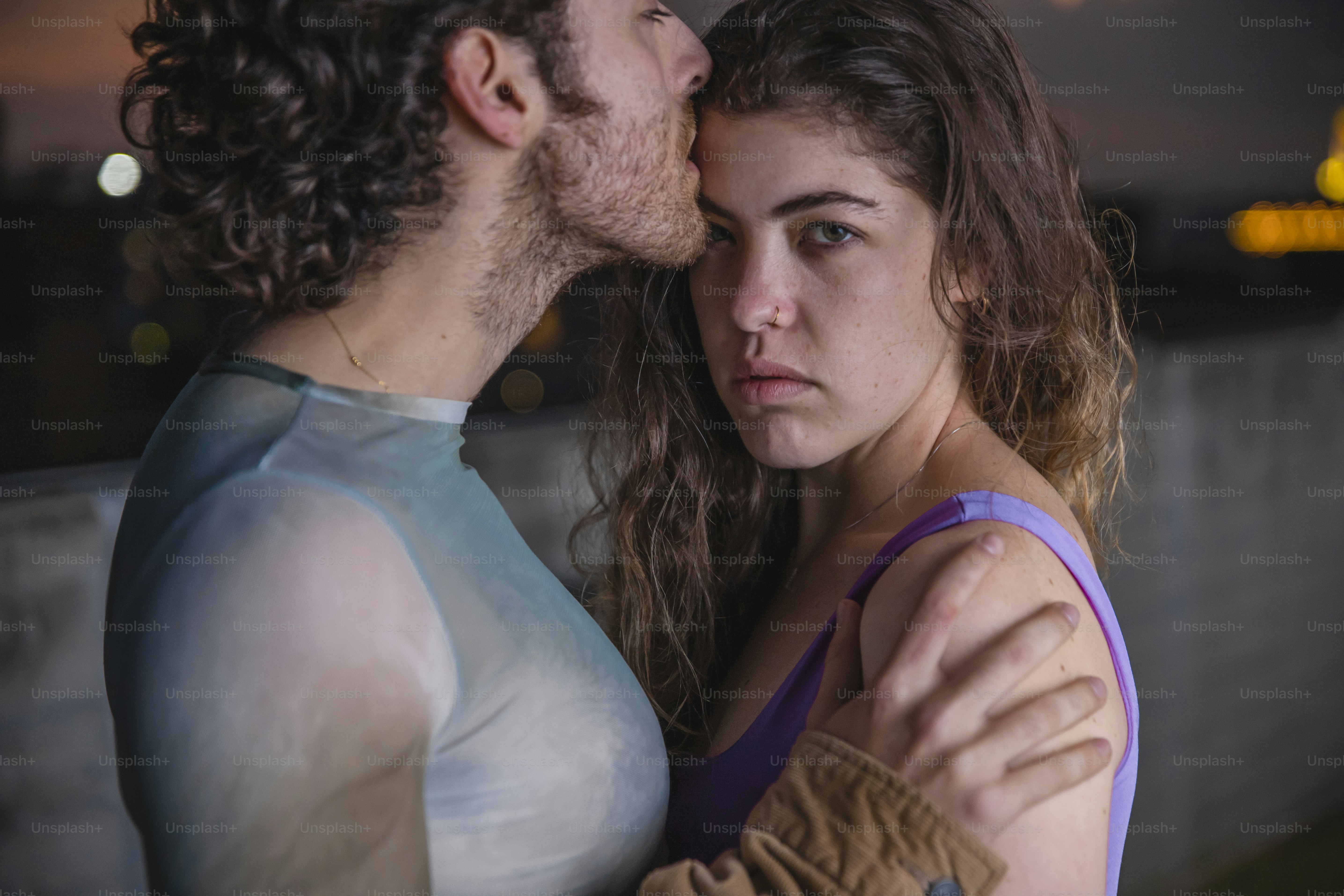 A man kissing a woman on the cheek photo – Community Image on Unsplash