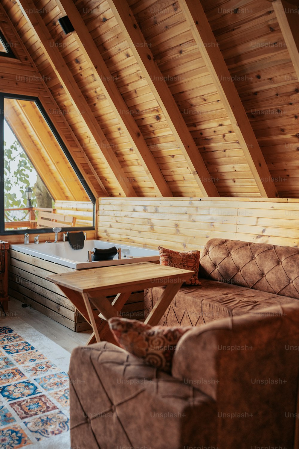 a living room with a couch and a table