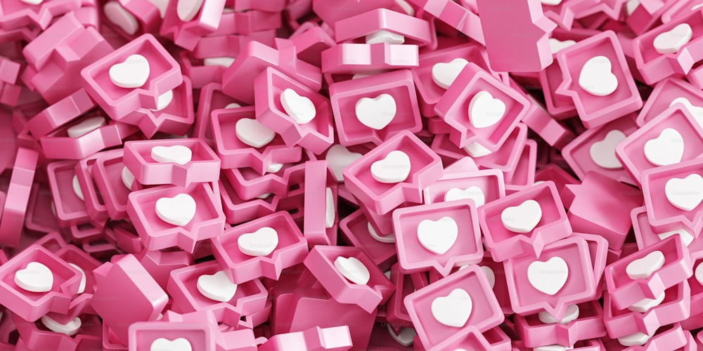 Una gran pila de corazones rosados y blancos