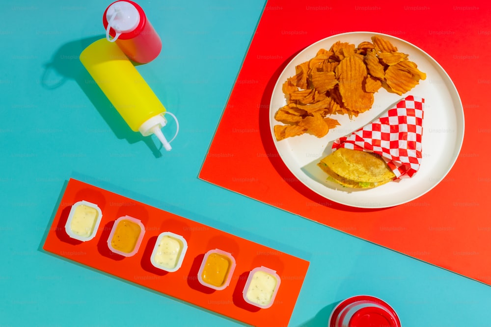 a plate of food on a blue and red table