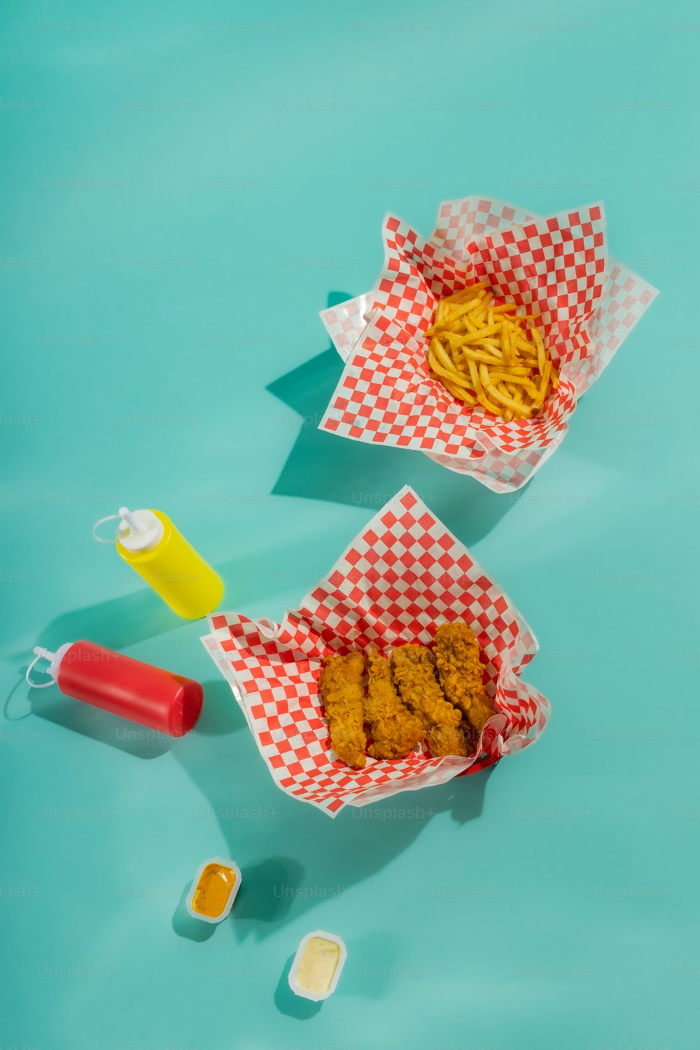 a couple of baskets filled with food on top of a table