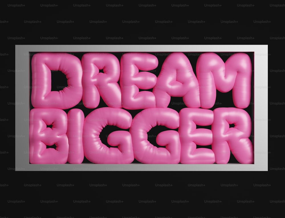Die Worte Dream Bigger bestehen aus Luftballons