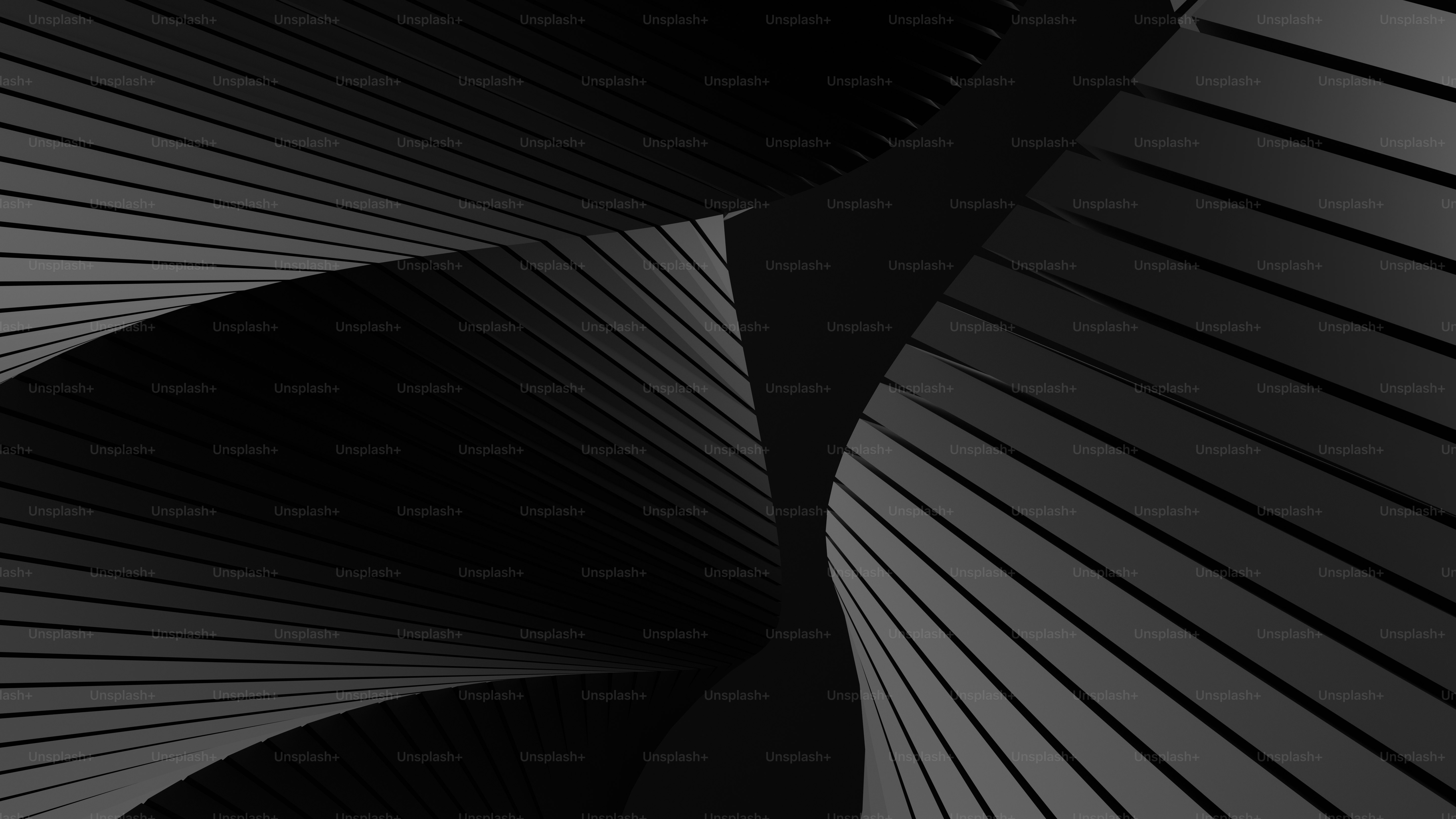 a black and white photo of a curved object