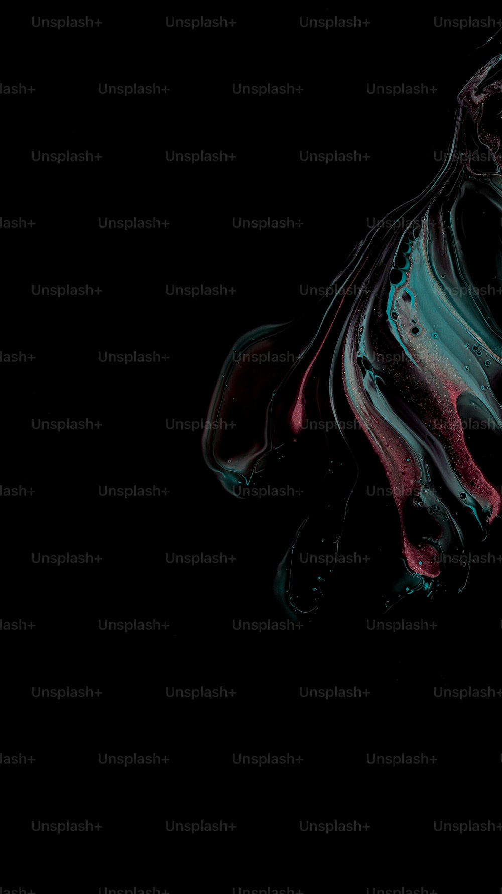 a black background with red and blue swirls