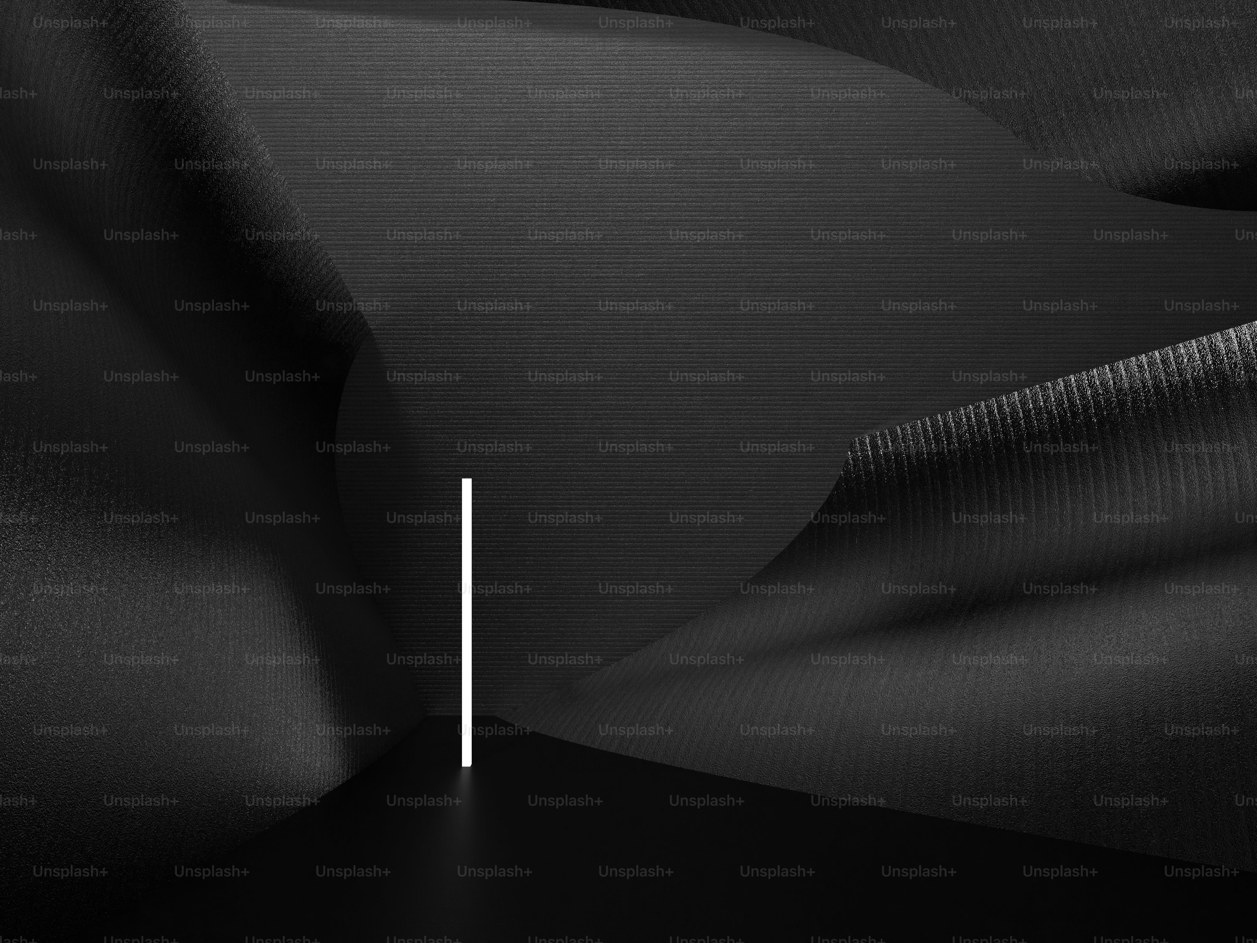 a black and white photo with a white stripe