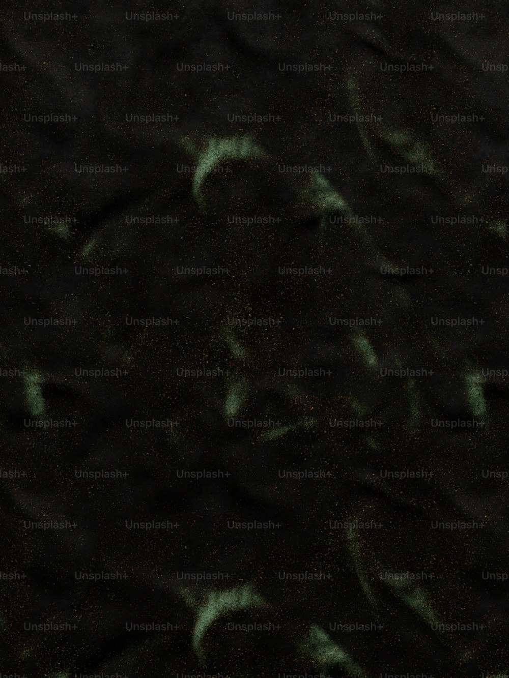 uma imagem desfocada de um fundo preto com estrelas brancas