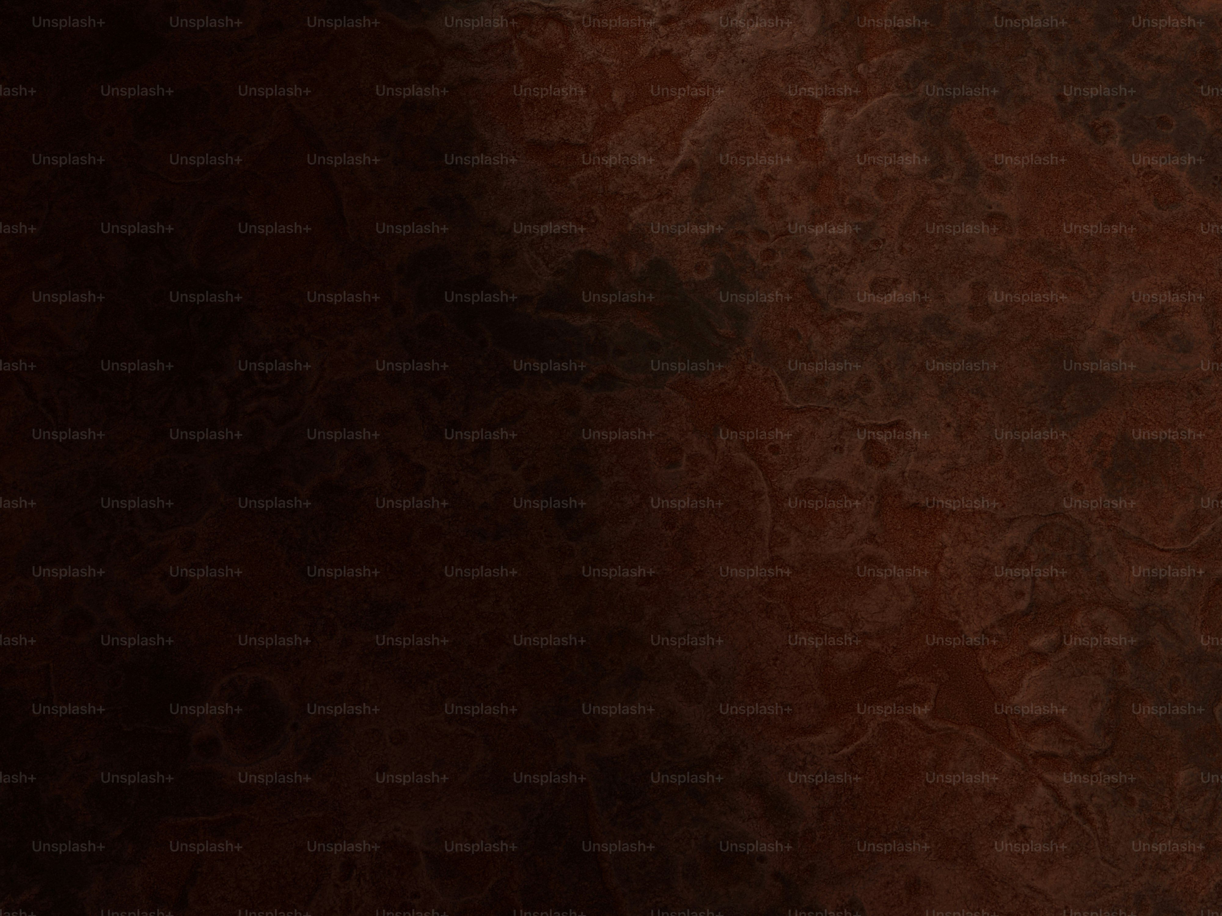 a red and black wall with a clock on it