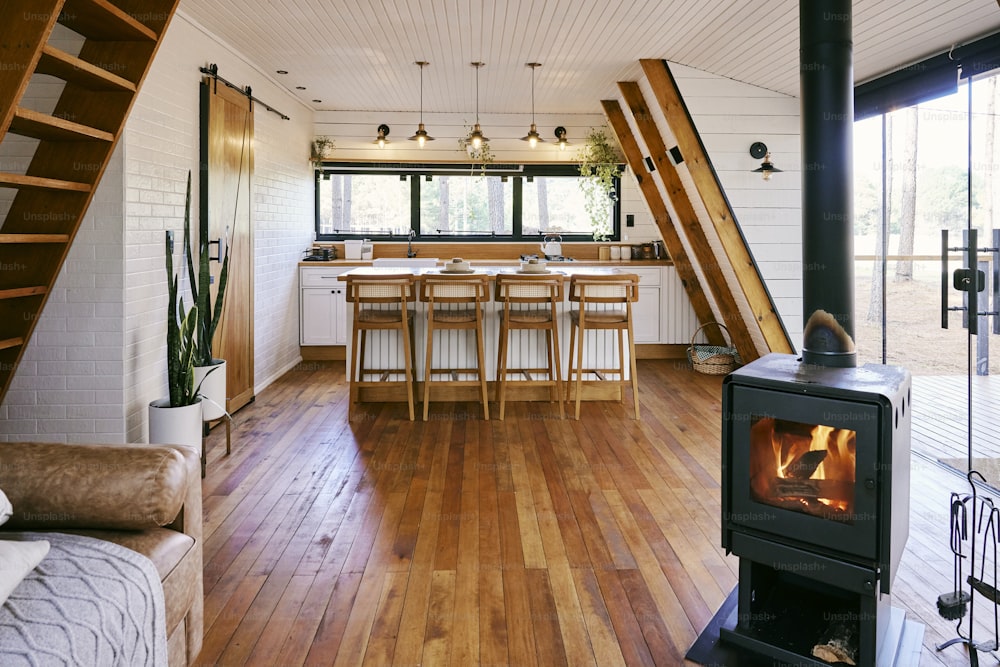 a living room filled with furniture and a fire place