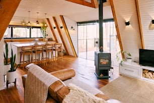 a living room filled with furniture and a fire place