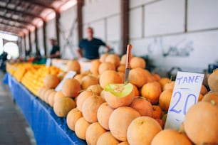 a display of oranges for sale at a market