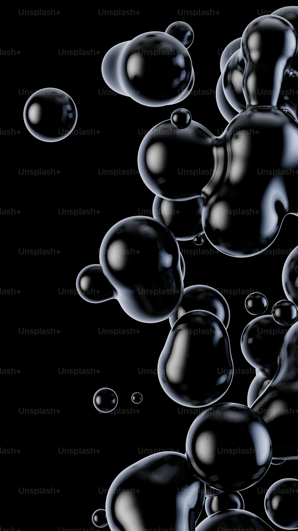 Un tas de bulles noires flottant dans l’air