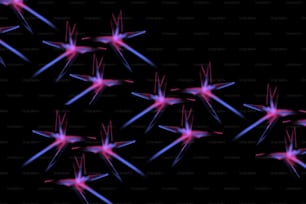 a group of pink and blue stars on a black background